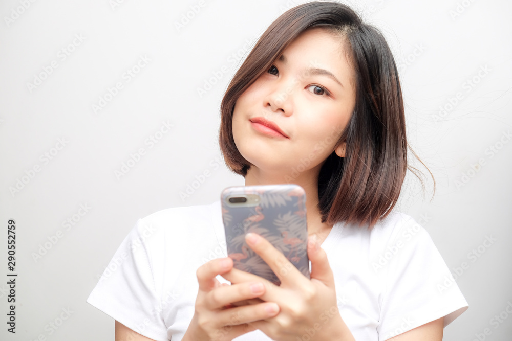 Business asian white shirt women using text on smartphone Business asian white shirt women using text on smartphone