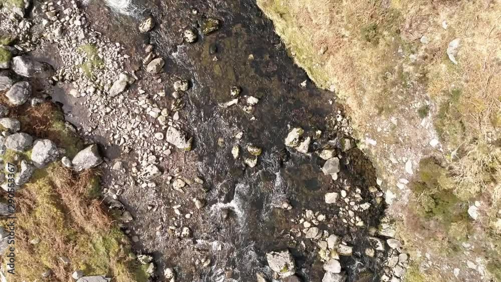 Overhead aerial, flowing stream in Ireland
