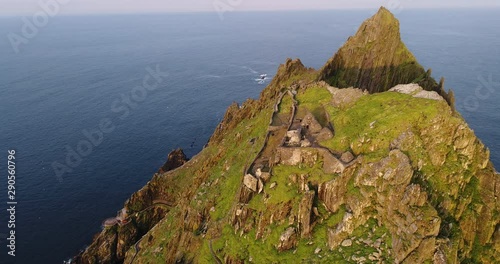 Wide aerial, ruins on island in Ireland