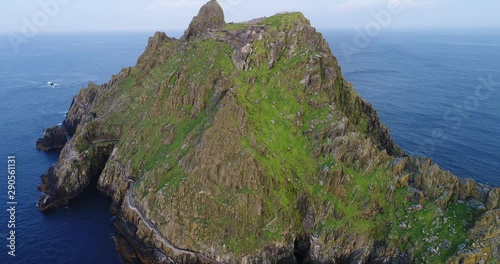 Wide aerial, coastal cliffs in Skellig Michael