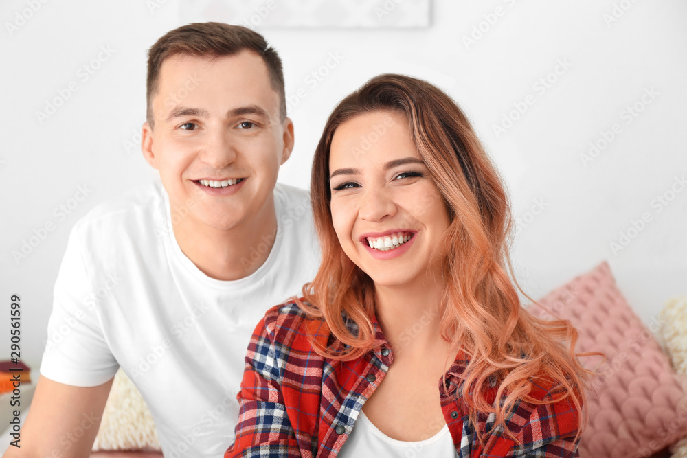 Portrait of cute young loving couple at home Portrait of cute young loving couple at home