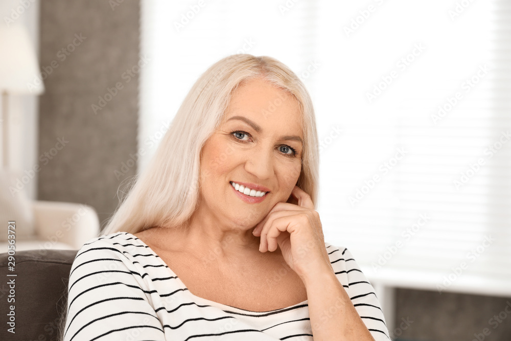 Fototapeta premium Portrait of mature woman with beautiful face indoors
