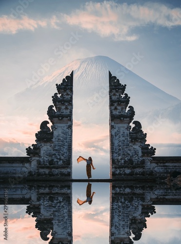 Wallpaper Mural Woman standing between Gate to heaven at Pura Lempuyang temple Torontodigital.ca