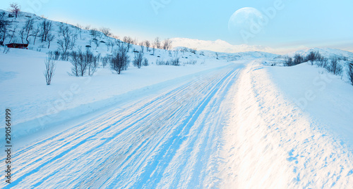 Beautiful winter landscape with snow and ice covered road - Arctic landscape - Snow covered road on a winter day - Tromso, Norway