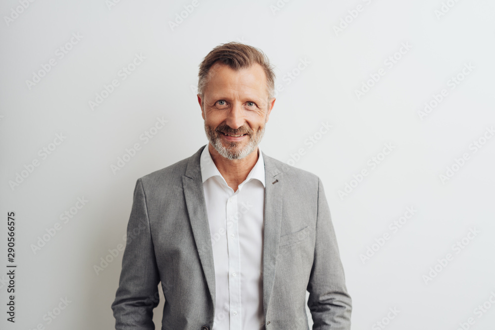 Smart middle-aged bearded man in grey jacket - obrazy, fototapety, plakaty 