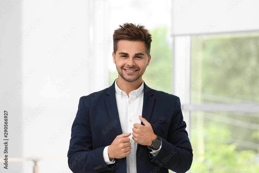 Portrait of handsome young man in elegant suit indoors Portrait of handsome young man in elegant suit indoors