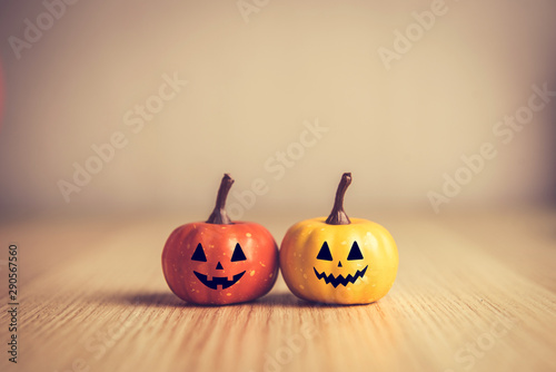 Happy Halloween concept, Pumpkin on wood background.