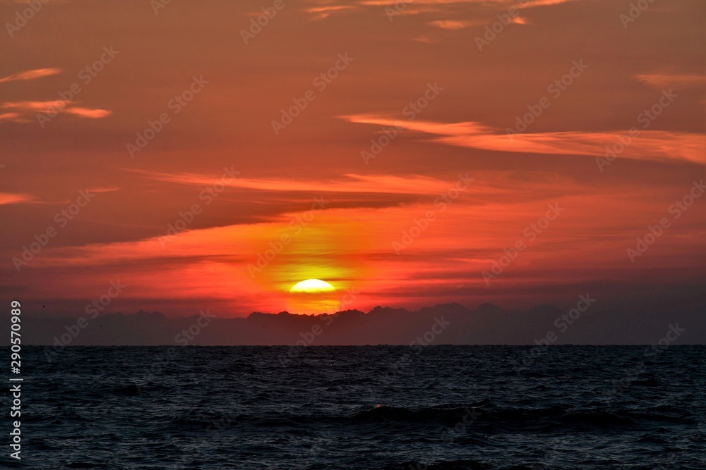 a sunrise at the seashore