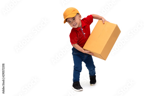 Happy kid Asian boy delivery man in yellow cap and red shirt standing with parcel post box isolated over white background, Two year one month old