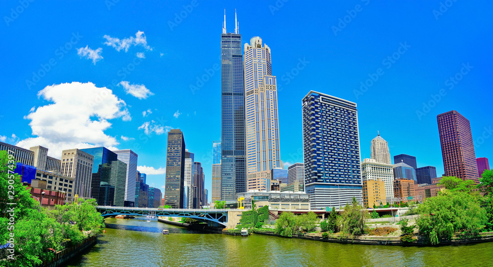 View of the Chicago River with the skyline of Chicago on a sunny day.