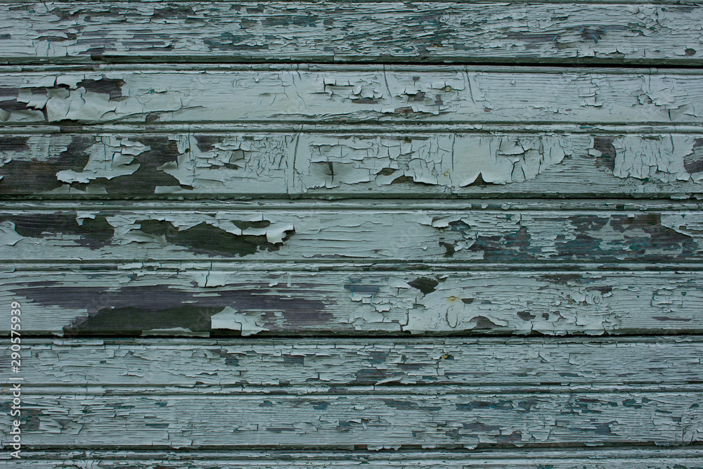 Fototapeta premium Old cracked paint on wooden wall 