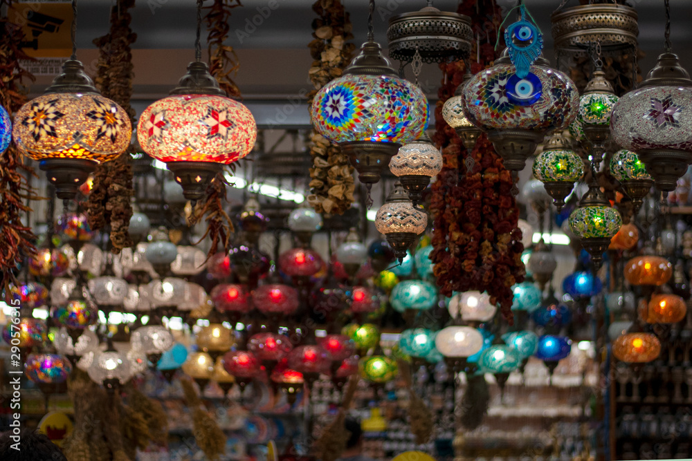 Multi-colored lamps in the eastern bazaar. Shop of oriental souvenirs.