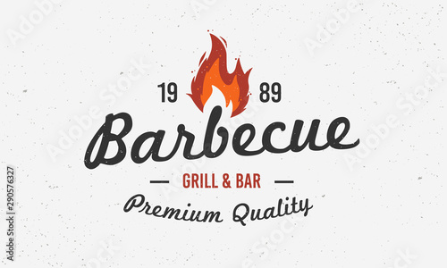 Barbecue vintage logo. BBQ grill logo, emblem, label with fire flame. Template for restaurant, cafe and steak house. Vector illustration