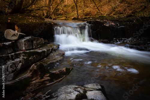 Incredible long exposure of a waterfall in Brecon Beacons National Park at sunset in Wales, UK in the fall.