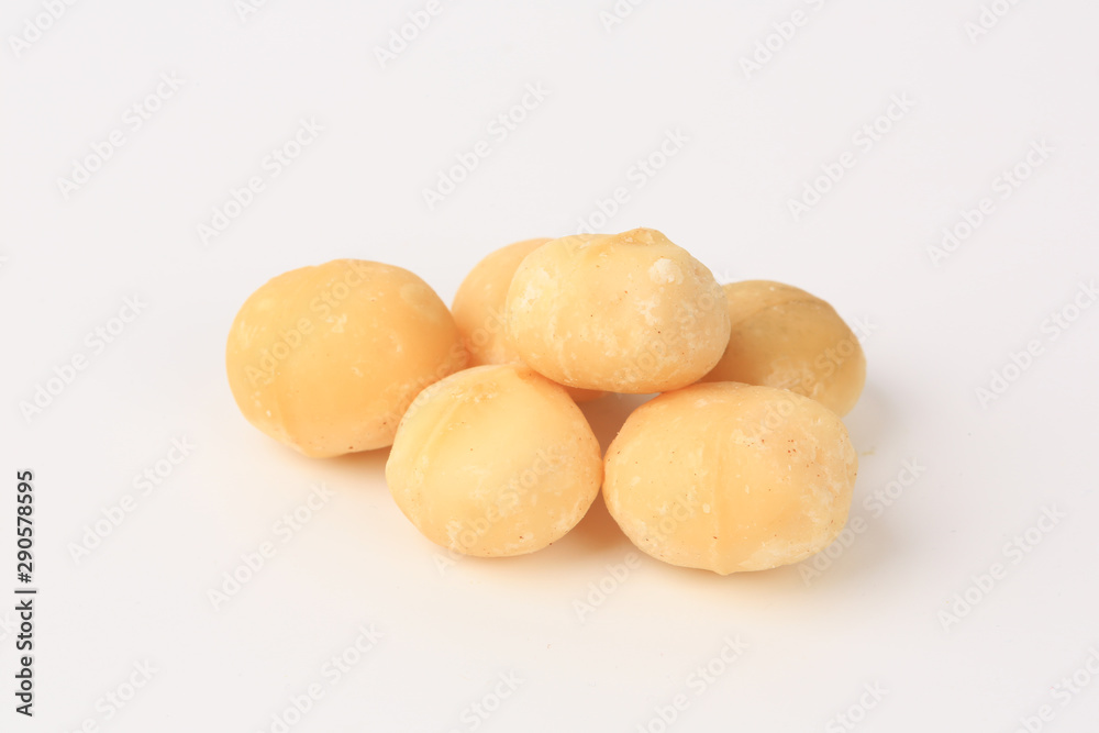 macadamia nuts on a white background macadamia nuts on a white background