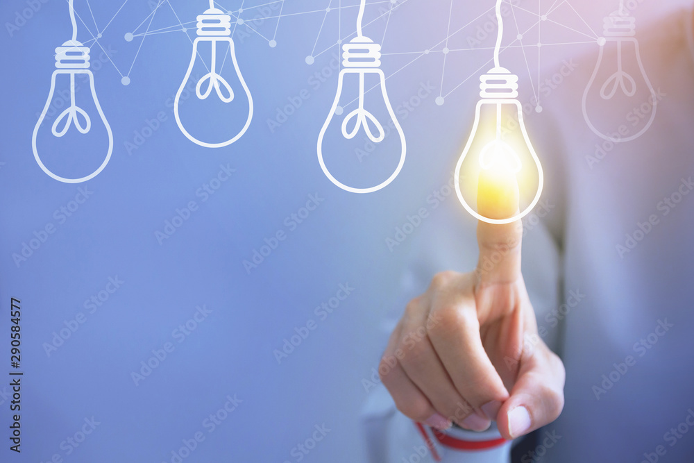 Businessman touching light bulbs new ideas with innovative