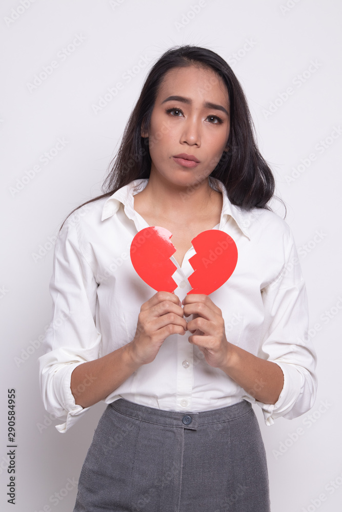 Beautiful young Asian woman with broken heart. Beautiful young Asian woman with broken heart.