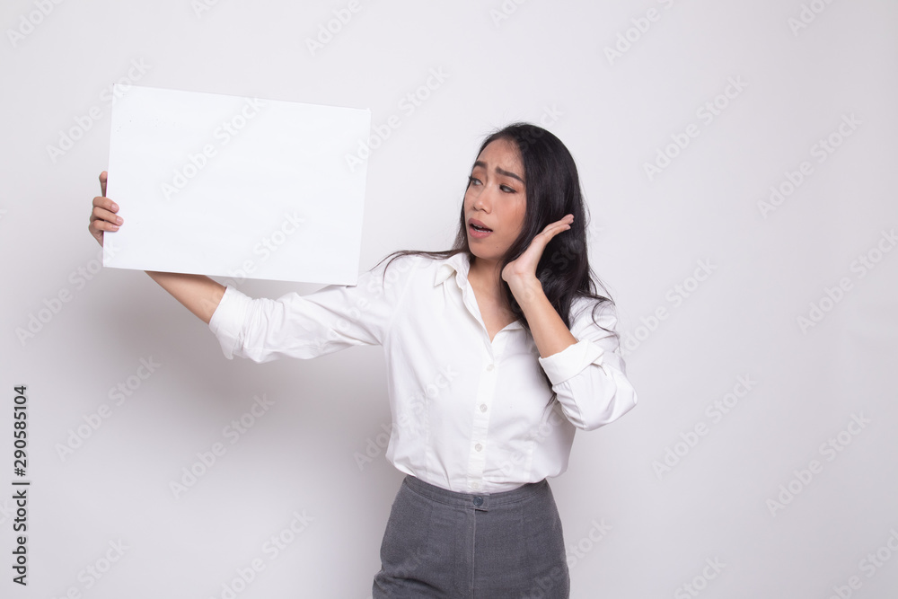 Young Asian woman surprise with white blank sign. Young Asian woman surprise with white blank sign.