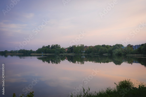 Landscape with lake water summer plants sunset water boats fishing view reflections, beautiful sky clouds calm leisure