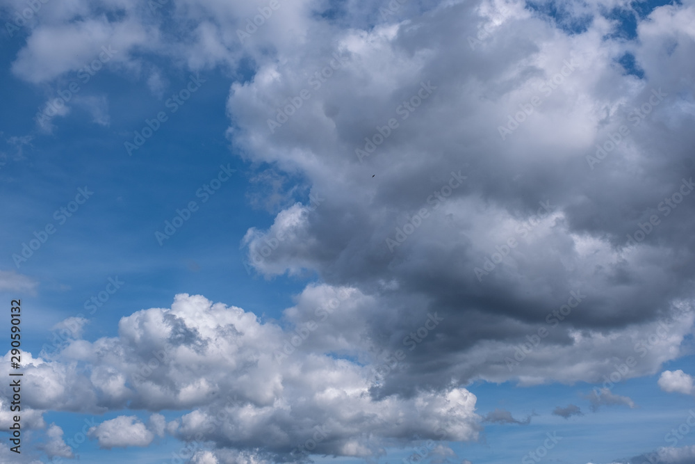 White Clouds In the Blue Sky. Natural background with Clouds White Clouds In the Blue Sky. Natural background with Clouds