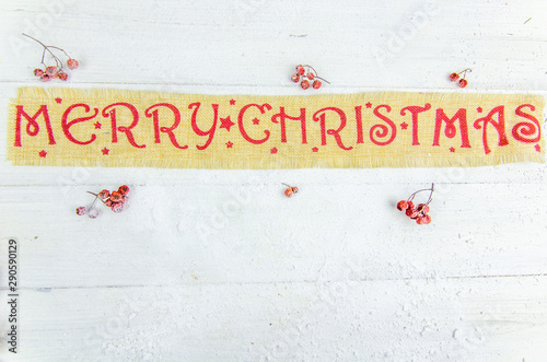 inscription merry schristmas on a white background photo