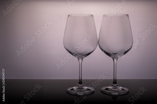 two empty glasses on a white background