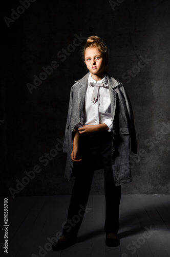 Fashion shooting in studio . Professional model , fashionable clothes and style, new collection. stylish look.