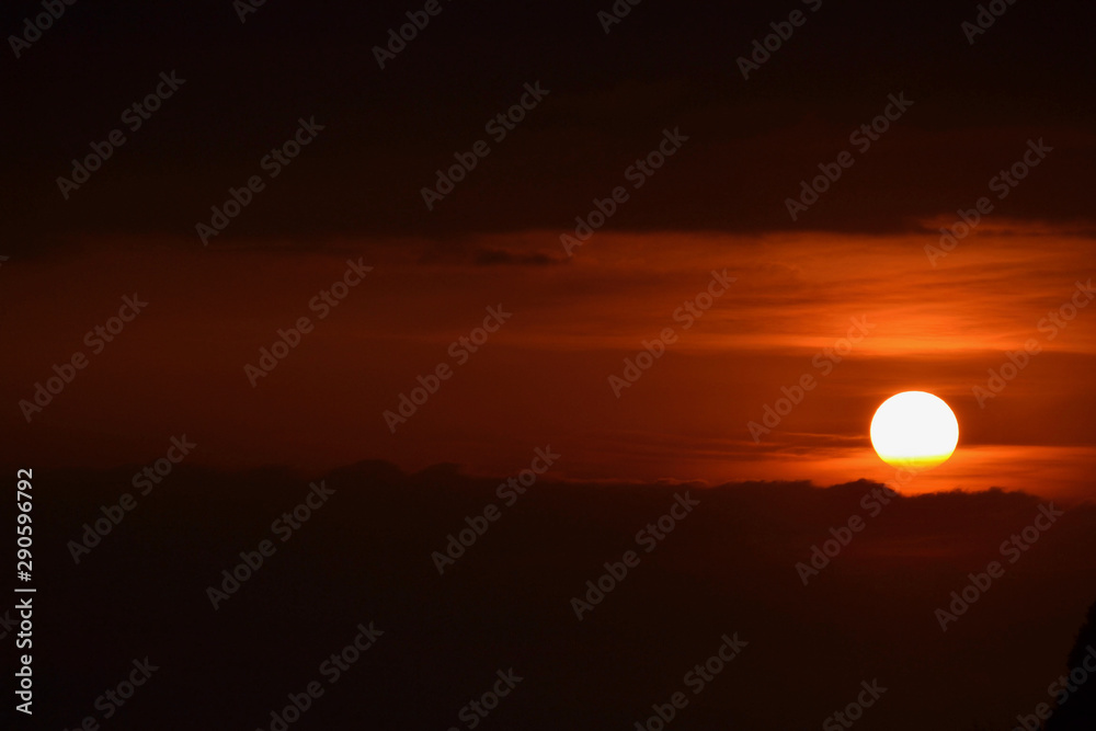 dawn sunrise spreading hues of orange in the sky at tiger hill