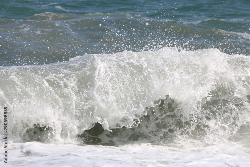 Beautiful turquoise wave in Mediterranean Sea, Greece