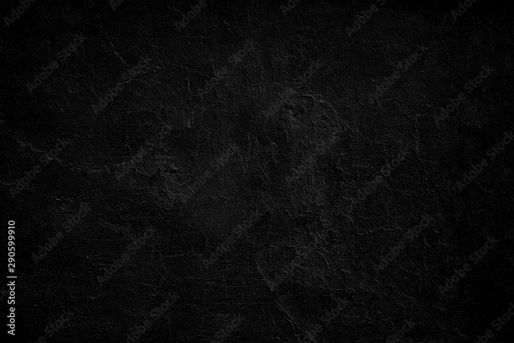 Neutral blank low contrast black textured background with roughness and irregularities to your concept or product. Black plaster painted on concrete stone wall.