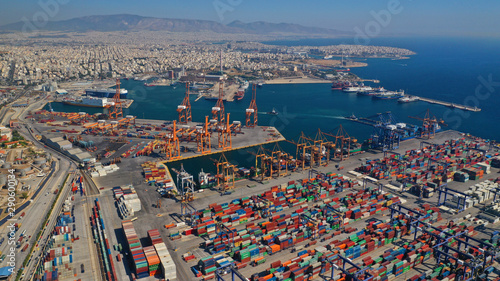 Aerial drone photo of industrial cargo container terminal in commercial port of Piraeus photo