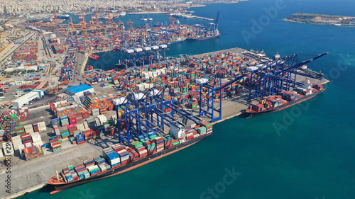 Aerial drone photo of industrial cargo container terminal in commercial port of Piraeus, Attica, Greece photo