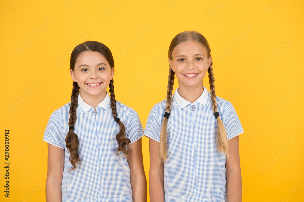 Happy childrens day. Equal protection civil rights and freedom from discrimination. Perfect schoolgirls. Schoolgirls vintage simple style outfit. Cheerful schoolgirls yellow background. Little girls Happy childrens day. Equal protection civil rights and freedom from discrimination. Perfect schoolgirls. Schoolgirls vintage simple style outfit. Cheerful schoolgirls yellow background. Little girls