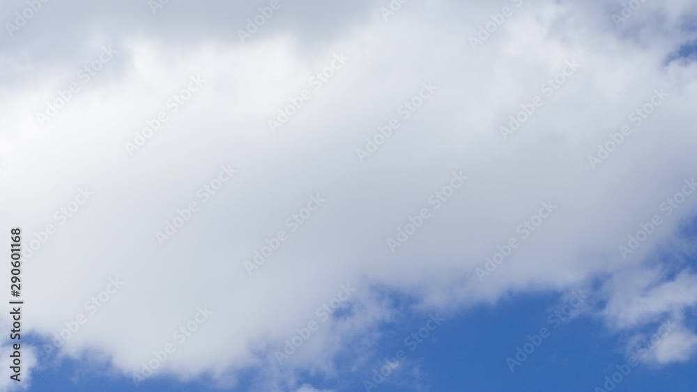 Many large clouds with little blue sky - photo time lapse recording. Many large clouds with little blue sky - photo time lapse recording.