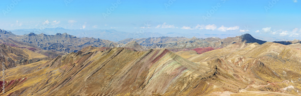 Stunning view at Palccoyo rainbow mountain (Vinicunca alternative), mineral colorful stripes in Andean valley, Cusco, Peru, South America