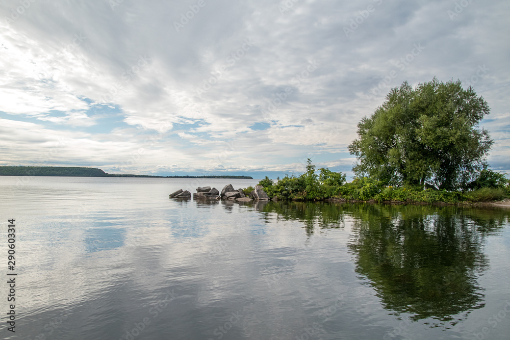 Tranquil island on a peaceful, calm lake
