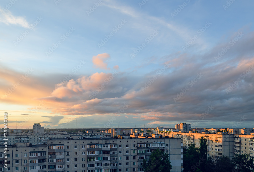 Beautiful clouds during sunset over the city, cityscape