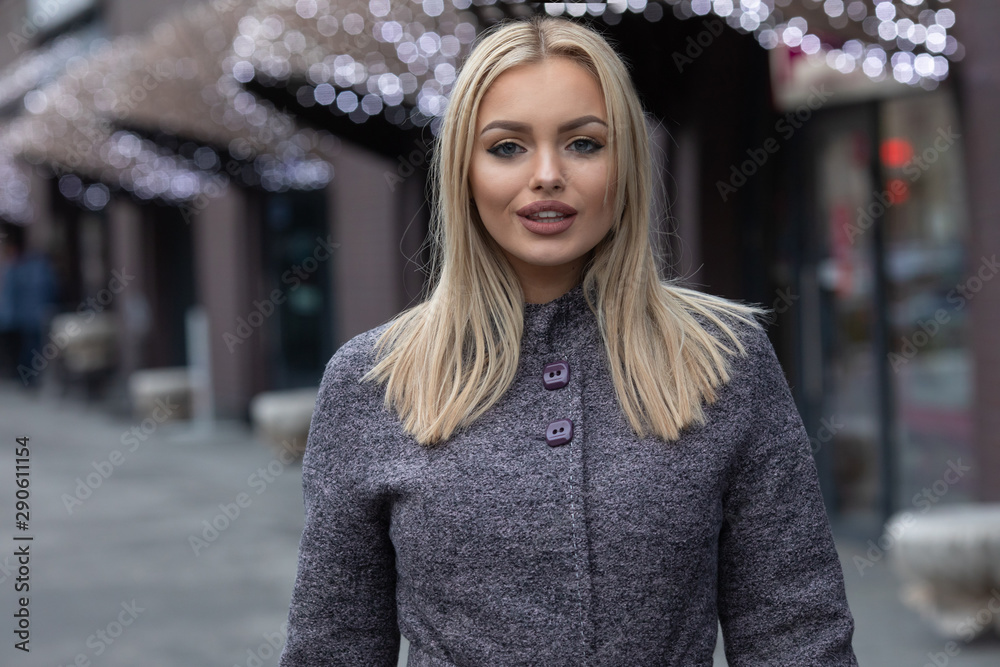 Portrait of young beautiful woman in autumn coat. Fashion photo. Portrait of young beautiful woman in autumn coat. Fashion photo.