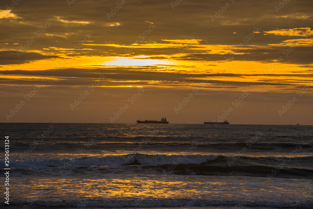 sunset on the beach with ships sunset on the beach with ships