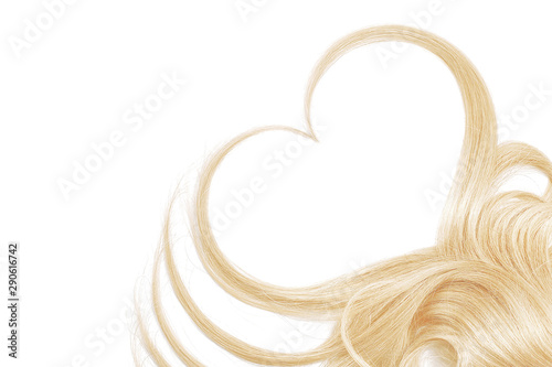 Blond hair in shape of heart isolated on a white background