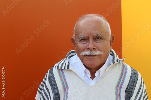 Tableau sur toile Candid of South American man wearing a poncho