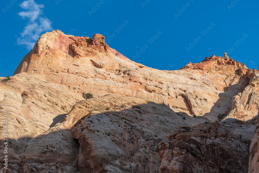 Capitol Reef National Park low angle landscape of colorful stone mountain side