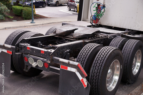 Rear of the tractor unit. Visible fifth wheel couplings are fitted to a tractor unit to connect it to the trailer.