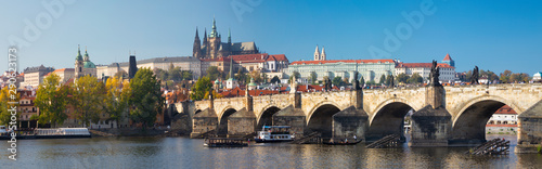PRAGUE, CZECH REPUBLIC - OCTOBER 11, 2018:The panorama of Charles Bridge, Castle and Cathedral withe the Vltava river.