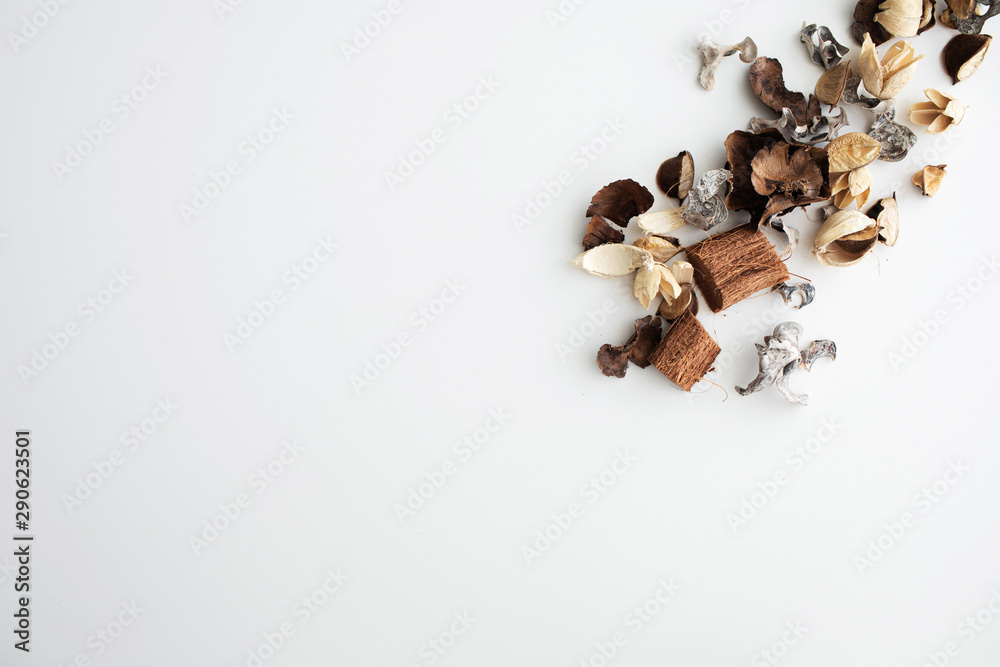 Fototapeta premium Flowers composition. Frame made of dried rose flowers on white background. Flat lay, top view, copy space