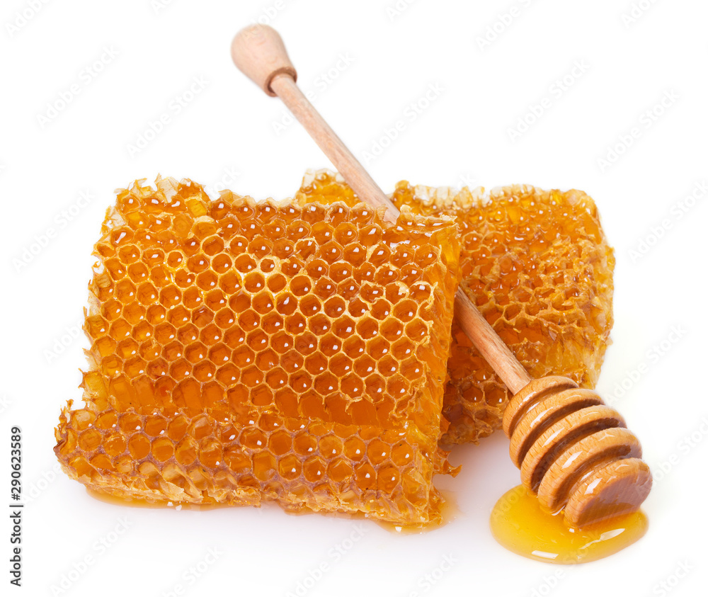 Honeycomb with honey on white background Honeycomb with honey on white background