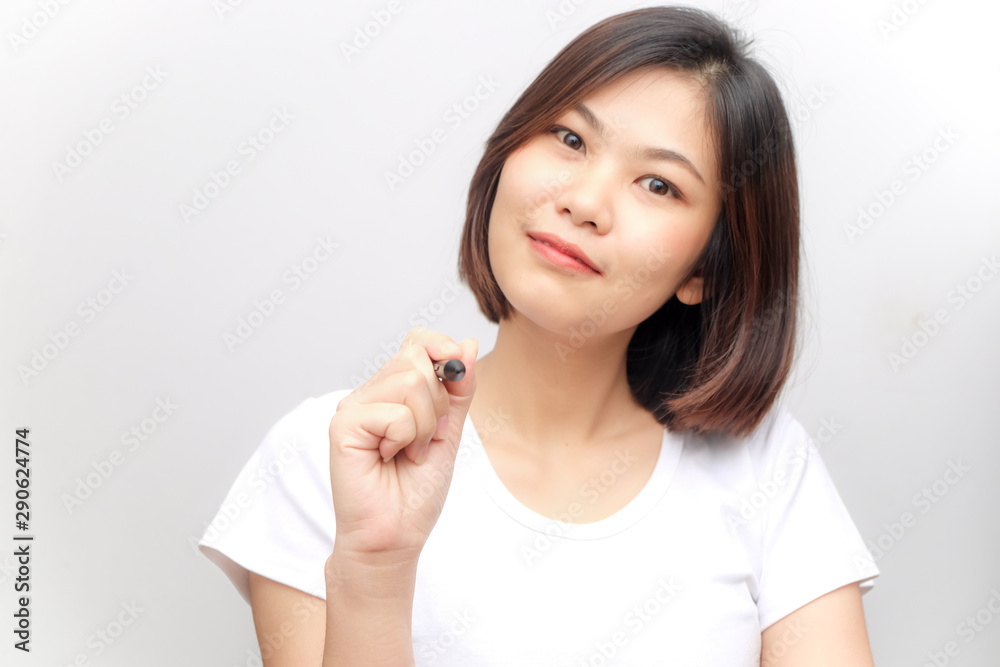 Asian business beauty fashion women hold pen on white background Asian business beauty fashion women hold pen on white background