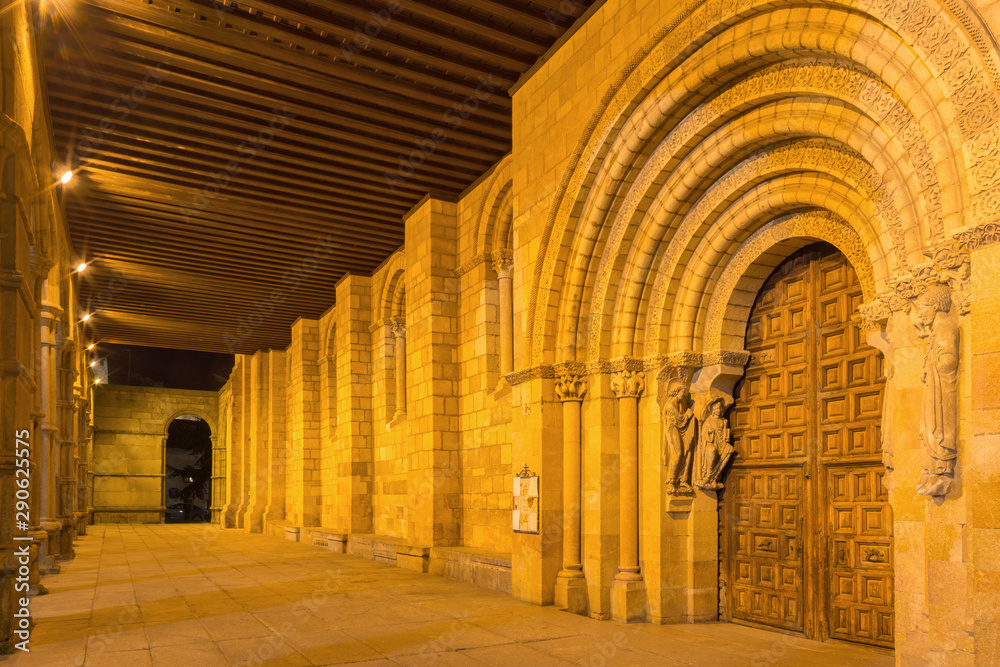 AVILA, SPAIN, APRIL - 19, 2016: The portico and romanesque south portal of Basilica de San Vicente with the apostles (1130).
