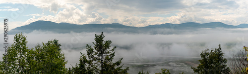 Foggy day by the St-Laurent river, golf field 