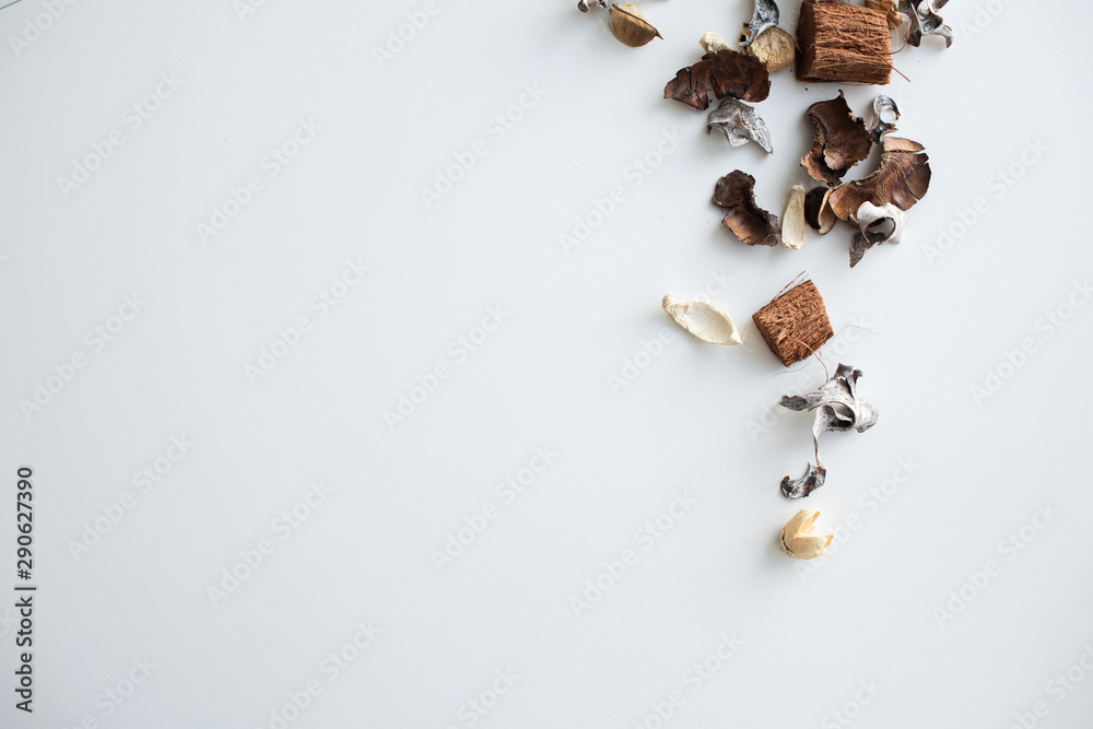 Flowers composition. Frame made of dried rose flowers on white background. Flat lay, top view, copy space Flowers composition. Frame made of dried rose flowers on white background. Flat lay, top view, copy space